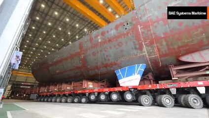 Video: Uusi video näyttää Britannian kuninkaallisen laivaston Type 26 -fregatin valtavan osan kuljetuksen