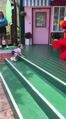 Toddler Walks up to Hug Man Dressed Like Cartoon Character