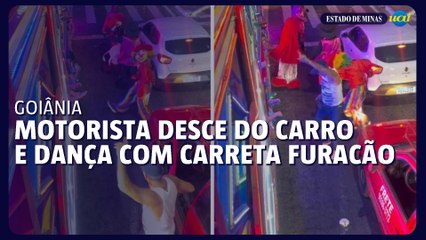 Motorista desce do carro e dança com trenzinho da alegria