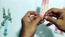 cara bikin origami pedang tanpa lem dengan uang kertas
