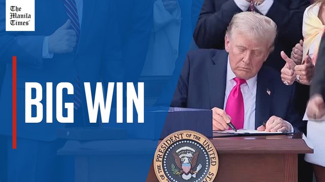 Trump signs tax cut, spending bill at July 4 White House gathering