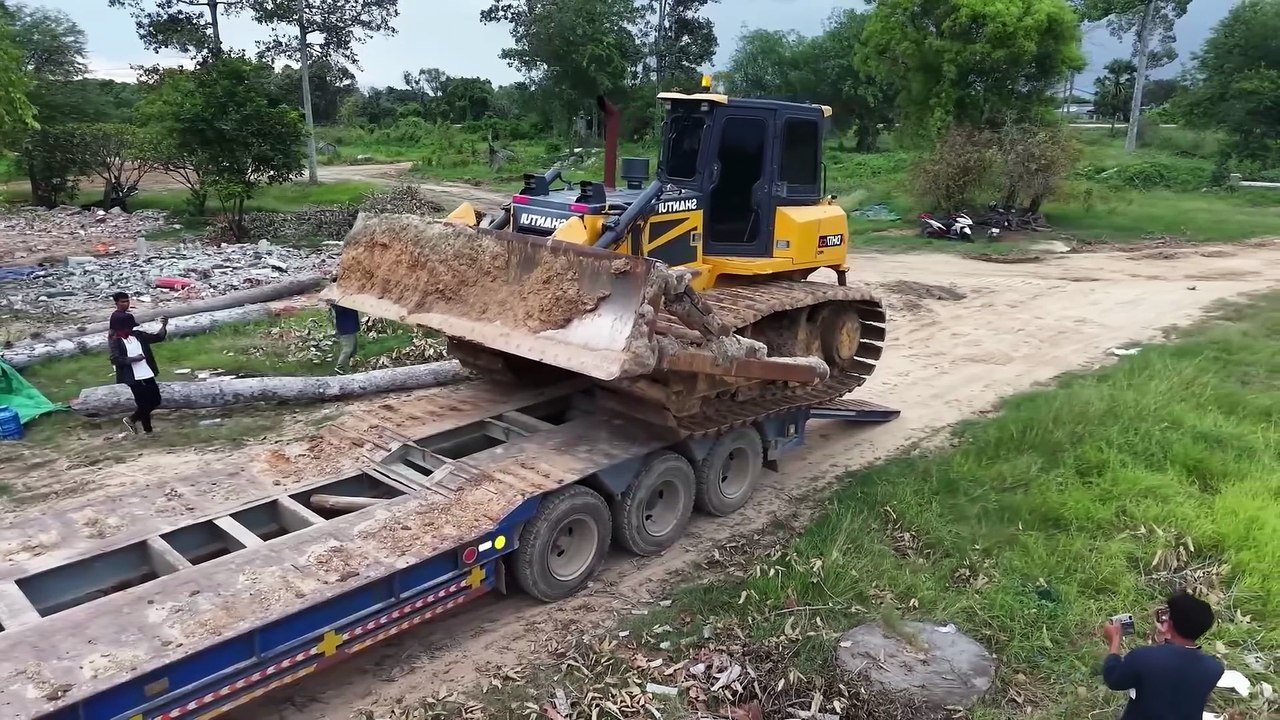 Recent Activities Include Filling In Large Lakes With Large Machinery Dozer Shantui Pushing Soil