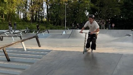 Scooter rider fails to land cool trick after sudden crash with child in his way