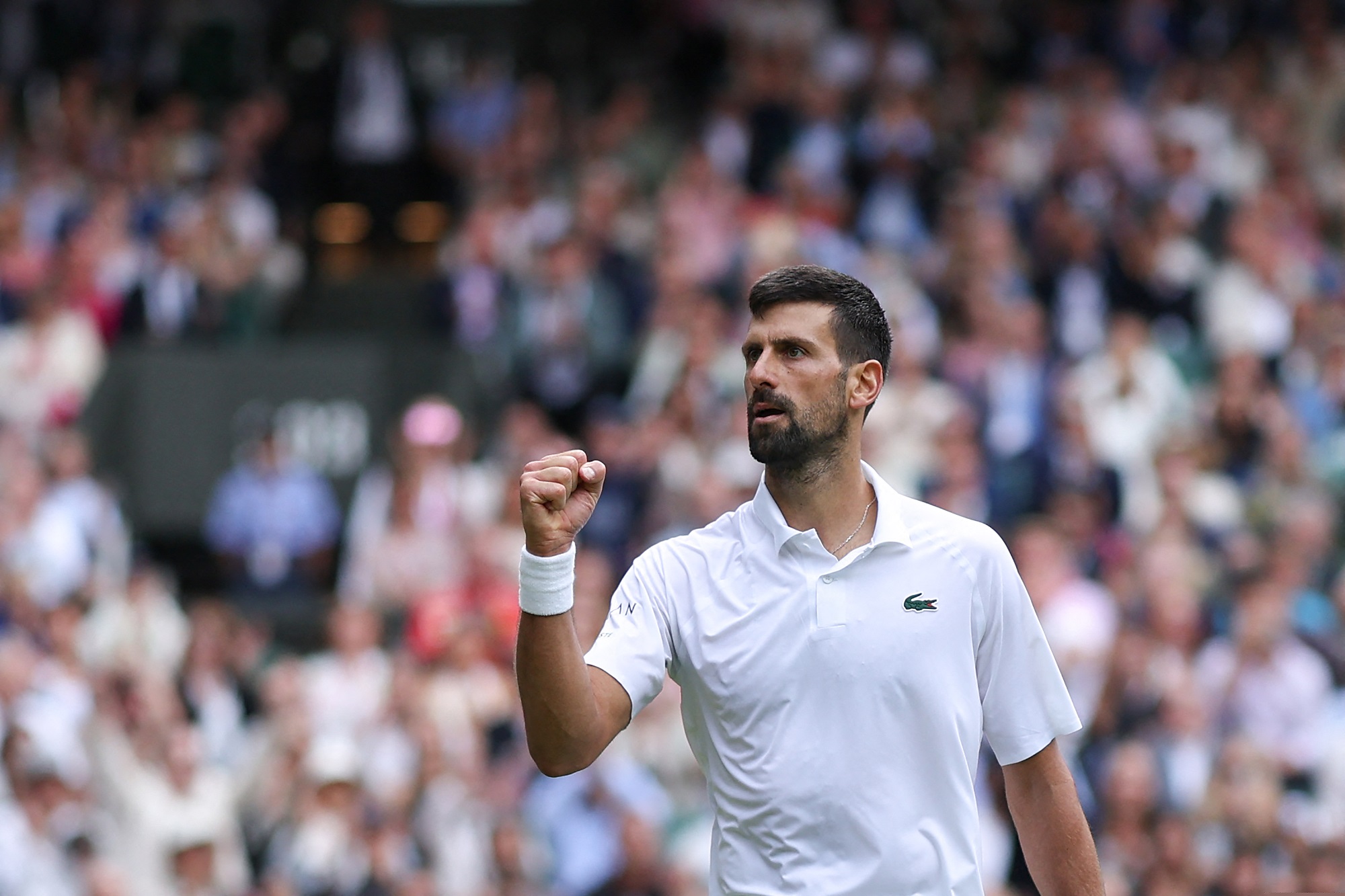 Djokovic survives scare to reach Wimbledon quarters