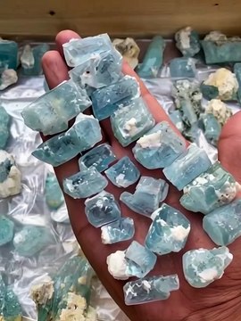 Rich blue aquamarine crystals with etched terminations