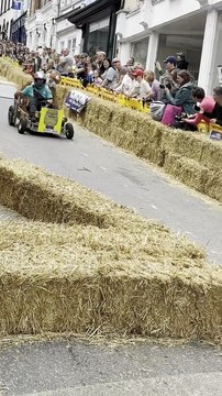 The second round of the Okehampton Men in Sheds travelling down the high street.