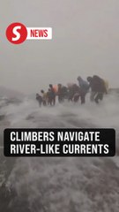 Heavy downpours on Mt Kinabalu strand dozens