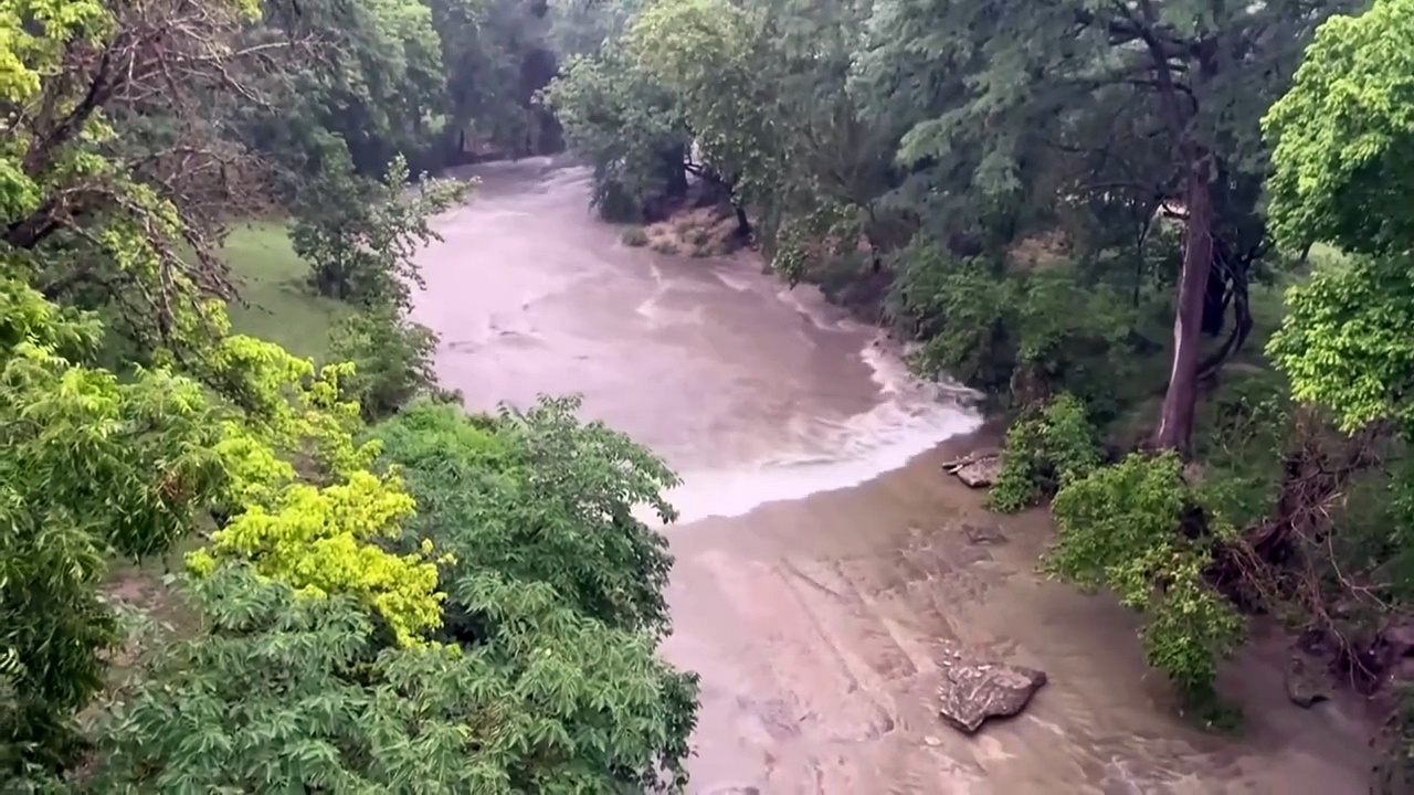 Watch: Rapid floodwaters sweep through Texas camp region
