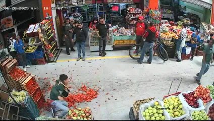 Guy Pushing Vegetable Cart From Behind Gets Pulled Down and Falls
