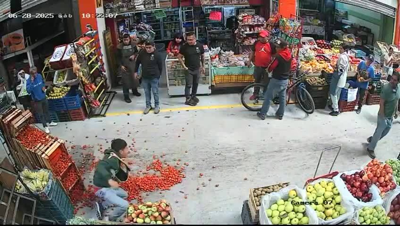 Guy Pushing Vegetable Cart From Behind Gets Pulled Down and Falls