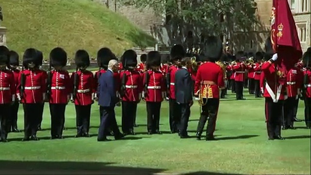 Macron inspects troops at Windsor with the King