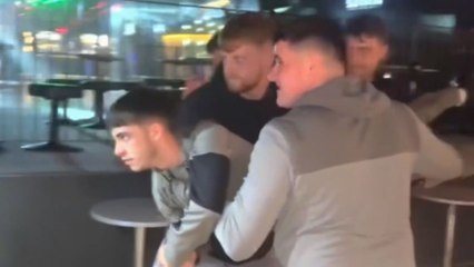 Intrusive thought wins as the boy slams his head into the arcade punch machine