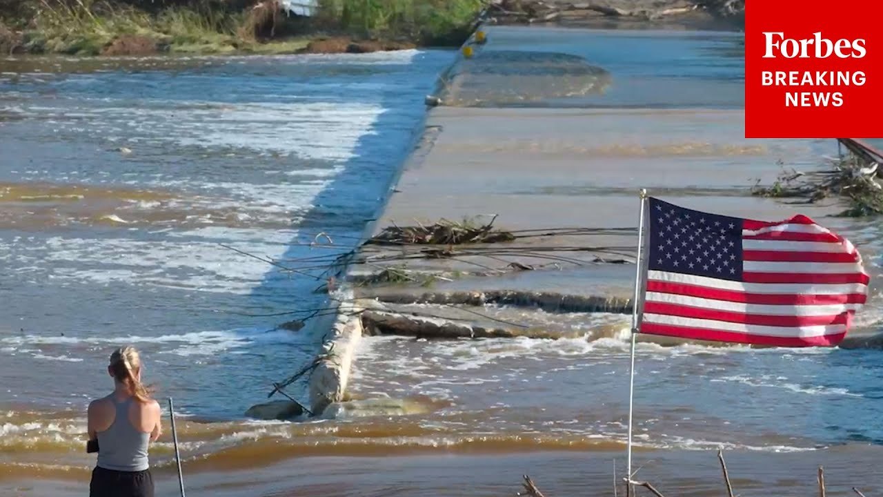 Residents Of Ingram, Texas, Inspect The Edges Of The Guadalupe River Following Deadly Flooding
