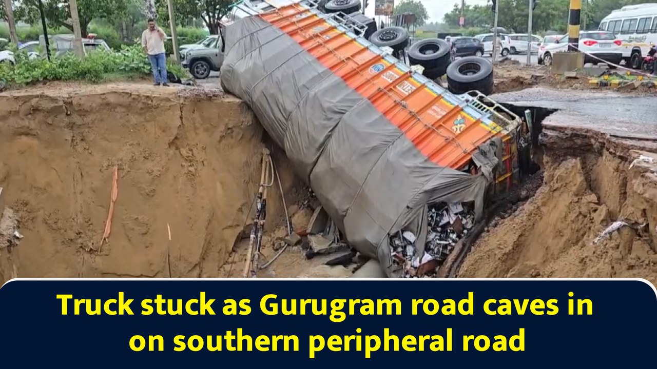 Truck stuck as Gurugram road caves in on southern peripheral road