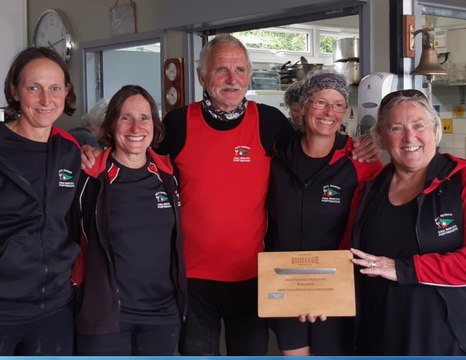 MYC Porthmadog rowers take three Celtic longboats to Moelfre