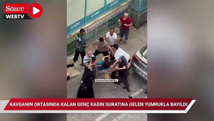 Kavganın ortasında kalan genç kadın suratına gelen yumrukla bayıldı
