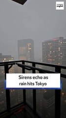 Sirens echo as rain hits Tokyo
