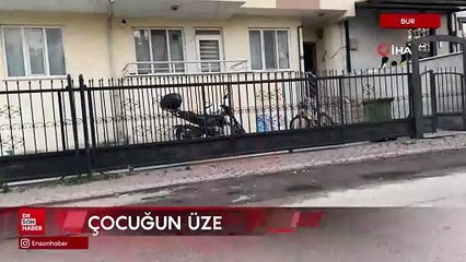 Bursa'da sürgülü kapının altında kalan çocuk ağır yaralandı