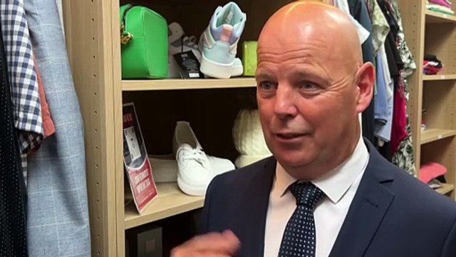 Nurse opens communal wardrobe for mental health patients