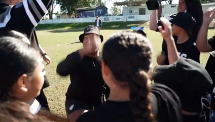 Australian NFL player comes home to convince kids to switch codes