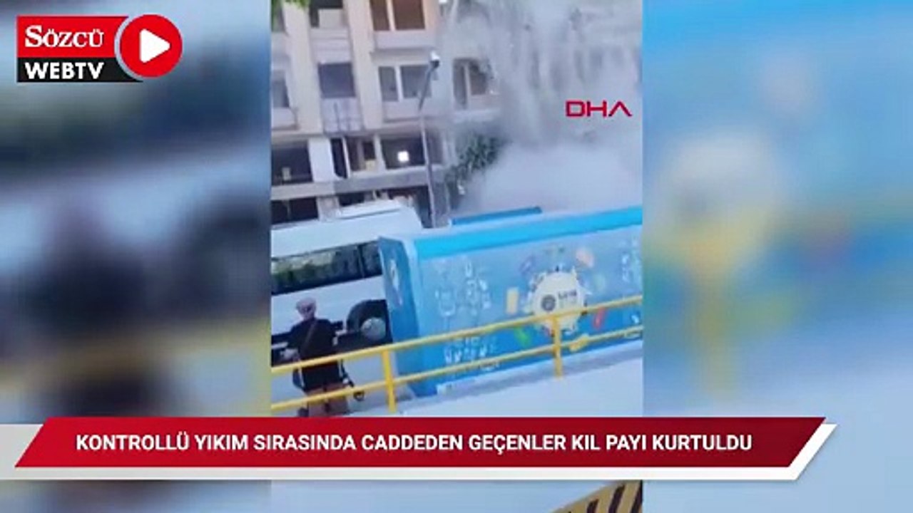 Zeytinburnu'nda kontrollü yıkım sırasında caddeden geçenler kıl payı kurtuldu