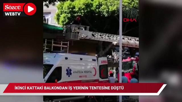 İkinci kattaki balkondan iş yerinin tentesine düştü