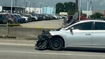 Car with hood half-open and spare tire takes over I-45 North like boss