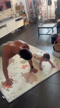 Adorable Little Baby Tries to Imitate Her Dad's Push-Up Moves