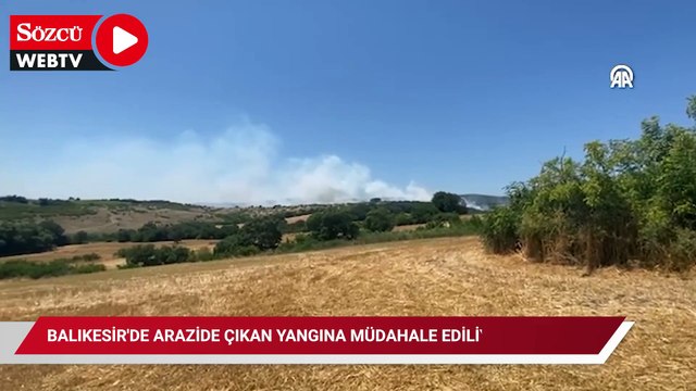 Balıkesir'de arazide çıkan yangına müdahale ediliyor