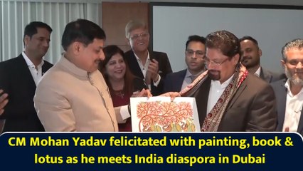 CM Mohan Yadav felicitated with painting, book & lotus as he meets India diaspora in Dubai