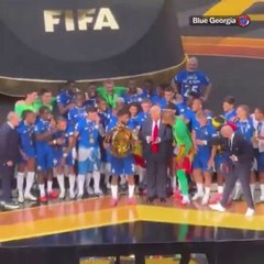 Confused Trump Stays on Stage for Trophy Lift