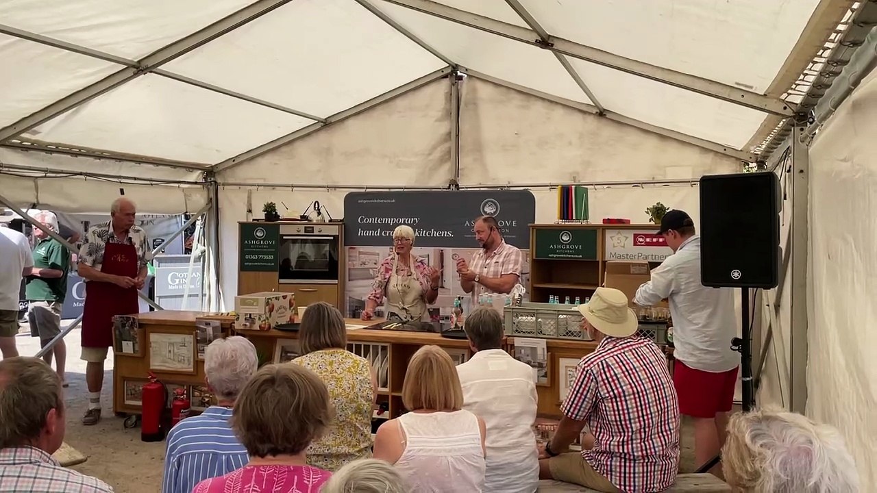 Mary Quicke of Quicke's and Barny Butterfield of Sandford Orchards during the cider and cheese pairing demo (Will Goddard, Crediton Courier)