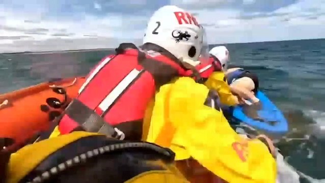 Dramatic moment unconscious woman drifting half a mile out to sea rescued by RNLI