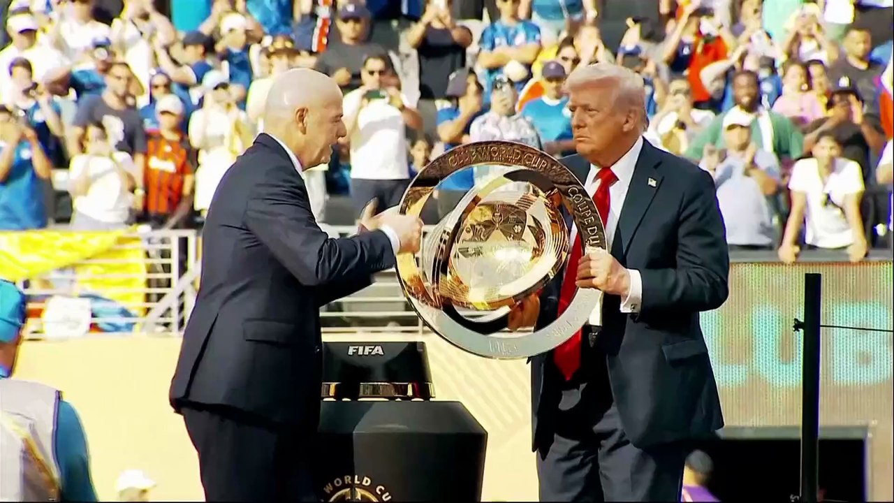 Trump puzzles Chelsea players as he crashes Club World Cup trophy party