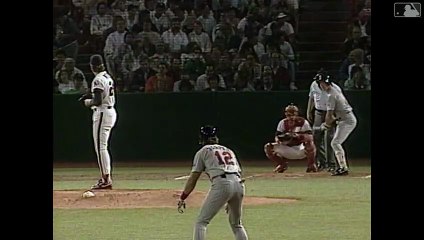 Jim Abbott (ANA) fields a grounder and then tags out Brian Harper between second and third (4/13/90)