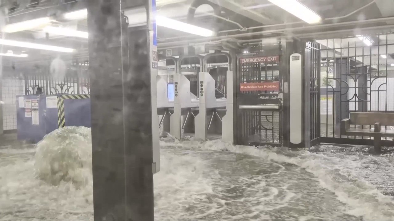 Floodwater gushes into New York city subway station amid heavy rainfall ...