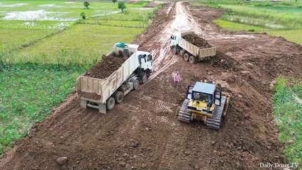 Best equipment machine operator Bulldozer KOMATSU making road and truck Spreading soil
