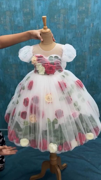Elegant & Poetic A garden of dreams stitched into a dress… 🌹✨ Every petal tells a story, every twirl brings magic #EtherealStyle #MiniMuse #FloralElegance #LittlePrincessLook #birthdaydress #firstbirthday#gardenthemeparty#floraldress #babydress