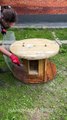 Upcycled wooden reel becomes a cozy chicken home
