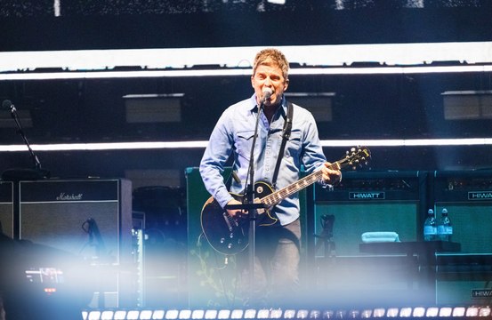 Steel fences have been erected around Heaton Park to stop ticketless Oasis fans from watching