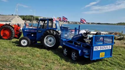 Tractors arriving for Peninsula Vintage Club's annual road run on a sweltering July summer's day