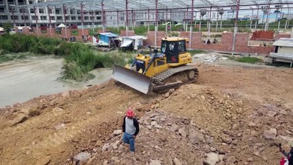 best equipment machine operator making road and truck Spreading soil