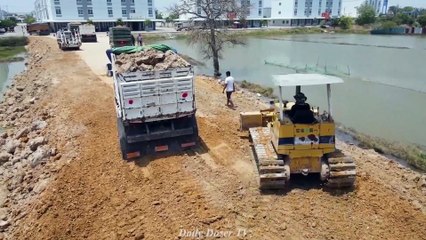 Best amazing!! impressive that the KOMATSU Dozer crew can even pour Stone to create New Water Road