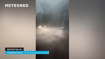 A wet downburst hit Novosibirsk, Russia! Winds exceeded 100 km/h, causing major damage