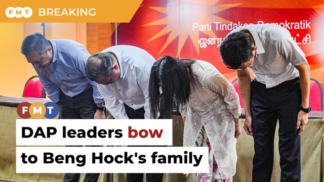 DAP leaders bow ‘in respect, sorrow’ to Beng Hock's family.