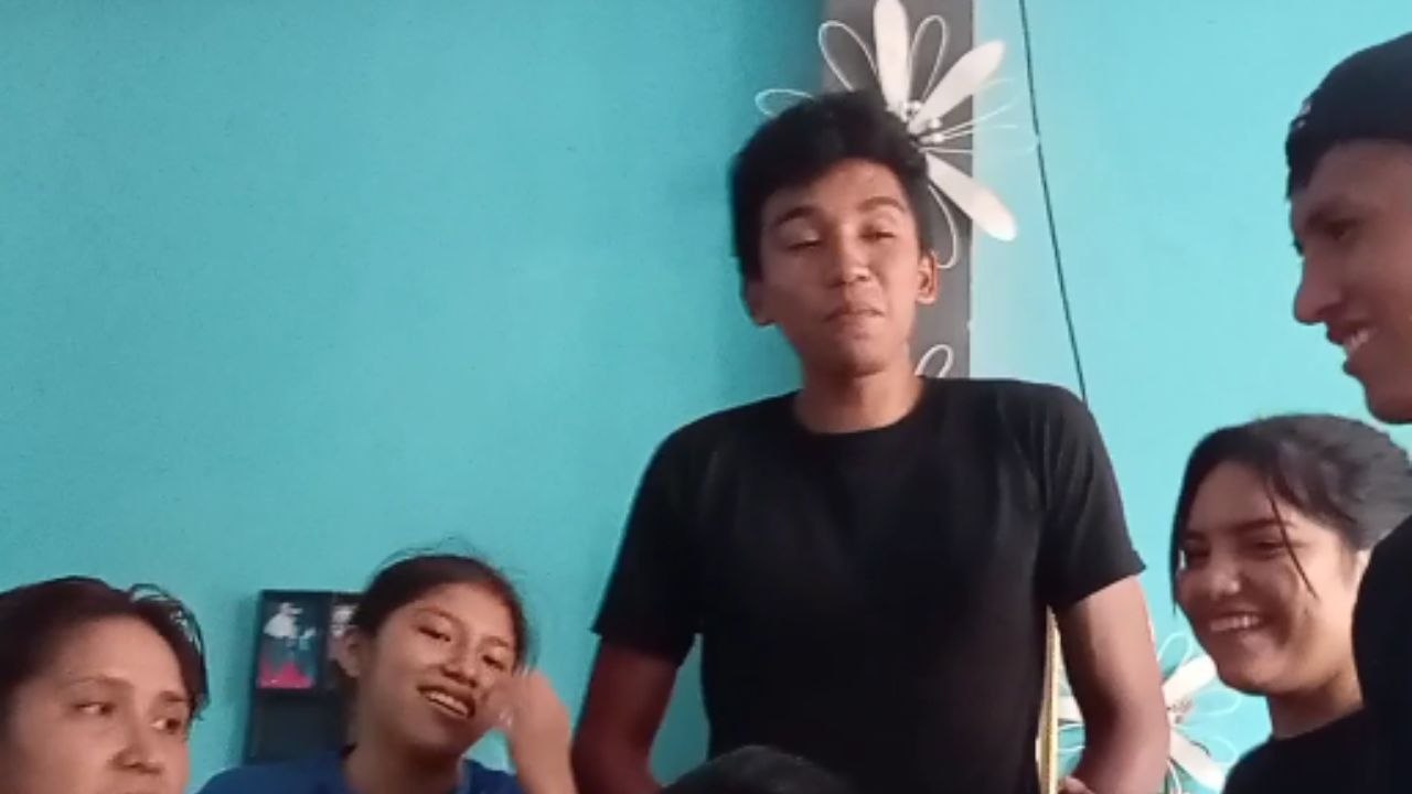 Mischievous attendees push birthday girl's head into cake during the party