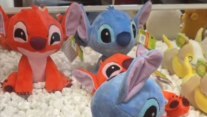 Girl almost wins a toy but the claw machine pulls a mean trick