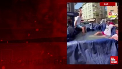 Bursa'da traktörün römorkunu havuz yapıp şehir turu attılar