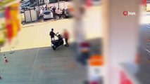 Motosikletli genç kız benzinliği birbirine kattı