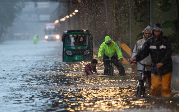 Philippines flooding displaces thousands, two missing